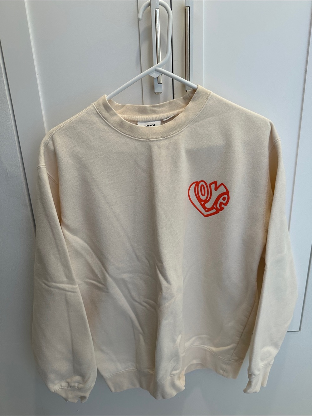 Obey Cream Sweatshirt with Coral “Love” Heart Logo